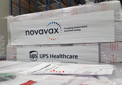 A shipping pallet of vaccines with Novavax's logo on it A shipping pallet of vaccines with Novavax's logo on it